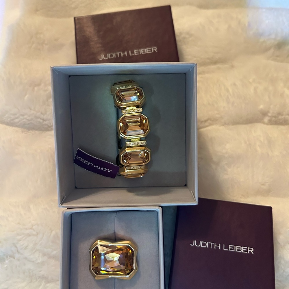 Judith Leiber A SET of Gold and Crystal Bracelet and ring.